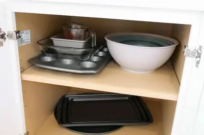 a kitchen utensils are sitting on a shelf at The Knocking Bird- Mins to CLE Clinic in Cleveland Heights