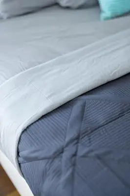 a close up of a mattress on a bed at Luxury Downtown Townhome Private Garage Unit 16 in Cleveland