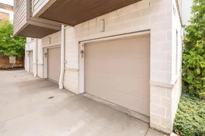 a couple of garage doors on a building at Luxury Downtown Townhome Private Garage Unit 16 in Cleveland