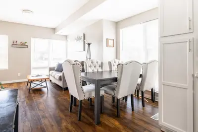 a dining room with a table and chairs at Luxury Downtown Townhome Private Garage Unit 16 in Cleveland