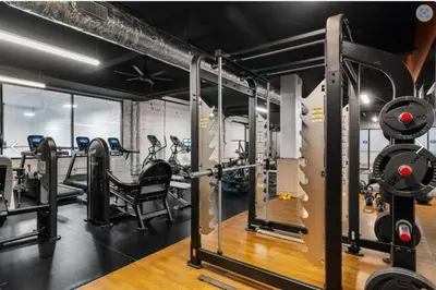 a gym with several treadmills and machines at Bengals Paycor Reds 6 min Walk Free Parking in Cincinnati