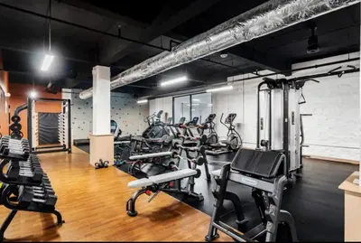 a gym with a bunch of cardio equipment in it at Bengals Paycor Reds 6 min Walk Free Parking in Cincinnati