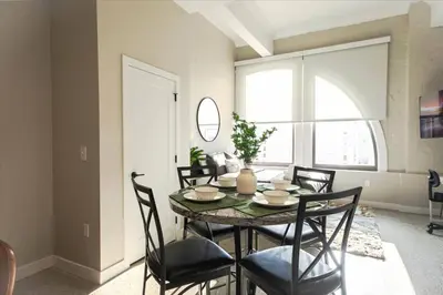 a dining room with a table and chairs at Bengals Paycor Reds 6 min Walk Free Parking in Cincinnati