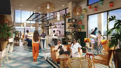a rendering of a restaurant with people sitting in chairs at 2 Brand new apartments with city views in Cleveland