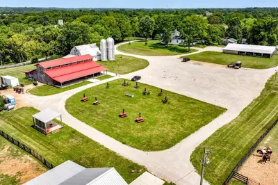 an aerial view of a farm with a barn at Vineyard Retreat at George Vest Historical Home in Verona
