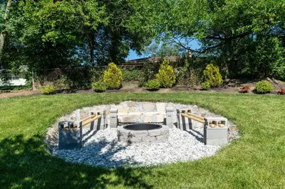 a fire pit in the middle of a yard at Luxury Midterm Rental for Families, Medical and Corporate Professionals Cincy in Cincinnati
