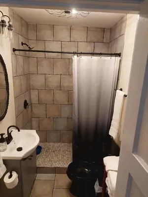 a bathroom with a shower and a sink at 5BR Home - Pets Allowed by ARK Experience in Williamstown