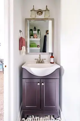a bathroom with a sink and a mirror at Jungle House Luxury Homes - Columbus Downtown Short North - Steps to Convention Center & Nationwide Arena - Sleeps up to 6 - Free Parking - Over 5,800 Five Stars in Columbus