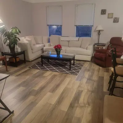 a living room with couches and a coffee table at Nice Condo on Nature Preserve in Dublin