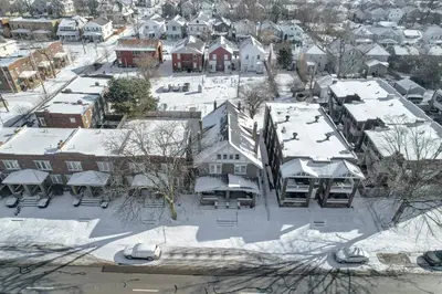 an aerial view of a town covered in snow at The Columbus Adventure in Columbus