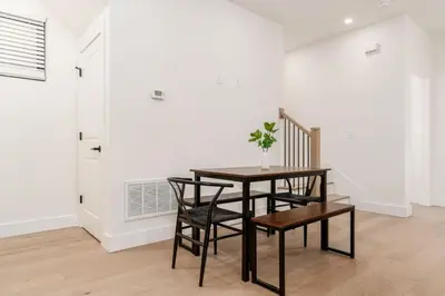 a dining room with a table and chairs at Luxury Escape 4BR 3 bath Oasis in Historic Old Town in Columbus