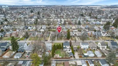 an aerial view of a residential neighborhood with a stop sign at The Huron Charmer-4 BD and Yard in Columbus
