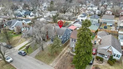 an aerial view of a residential neighborhood with a red sign at The Huron Charmer-4 BD and Yard in Columbus