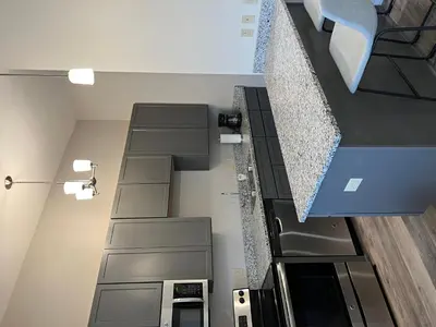 a room with a staircase in a house at Strongback Suite 205 in Adrian