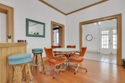 a dining room with a table and chairs at The Retro Getaway in Columbus