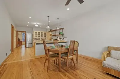 a kitchen and dining room with a table and chairs at The Urban Oasis - 2 BR - Great Location in Columbus