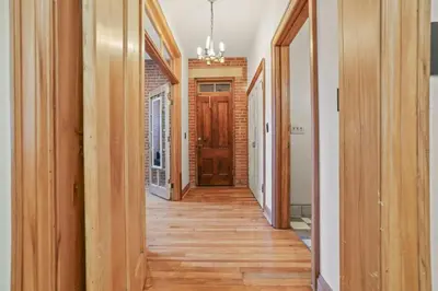 a hallway of a house with wooden floors at The Urban Oasis - 2 BR - Great Location in Columbus