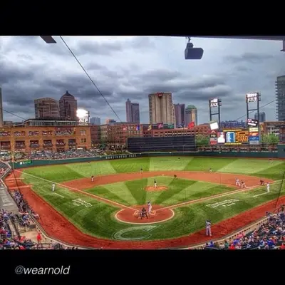 a baseball game in a stadium with a crowd at The City Cottage - Unique and Cozy in Columbus