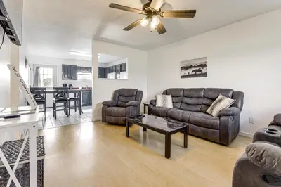 a living room with a couch and a table at Quiet Dry Ridge Home with Yard - Near Ark Encounter! in Dry Ridge