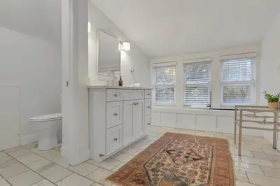 a white bathroom with a sink and a toilet at The Goodale Overlook in Columbus