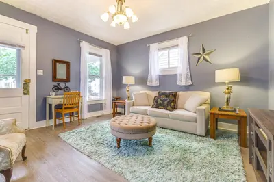 a living room with a couch and a table at Dog-Friendly Dayton Home 1 Mi to Downtown! in Dayton