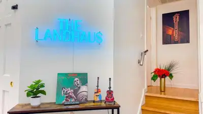a table with a sign that reads the lampluses at Downtown Cleveland- Steps to Sports & Events condo in Cleveland