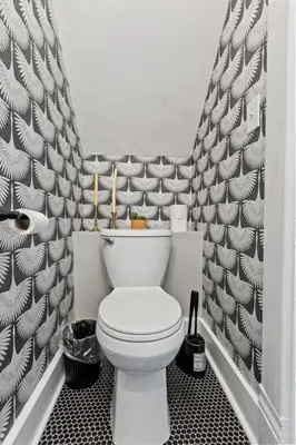 a bathroom with a white toilet in a room at The Luxe Hot Tub Private Bar 12 Min to Horse Park in Georgetown