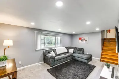 a living room with a couch and a window at 4 Mi to MetroParks Ice Rink Pet-Friendly Getaway in Dayton