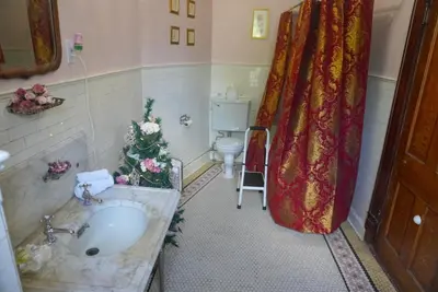 a bathroom with a sink and a toilet at Main Oak Manor in Gallipolis