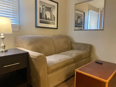 a living room with a couch and a table at Dayton with 6 Beds Sleeps 8 4 Bedrooms plus WIFI in Dayton