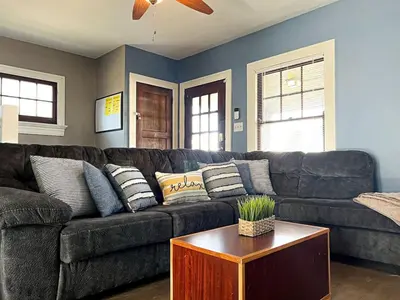 a living room with a couch and a table at 3 Bedroom House, 7 Beds, Sleeps 10, Dayton in Dayton