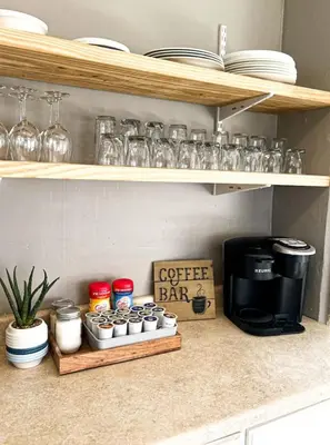 a shelf with cups and a coffee bar in a kitchen at Sleeps up to 20 in Dayton with 6 Bedrooms plus 2 Full Kitchens in Dayton