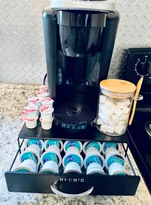 a coffee maker sitting on a shelf with cups at Downtown Home 10 Beds Sleeps 14 w Parking in Cincinnati