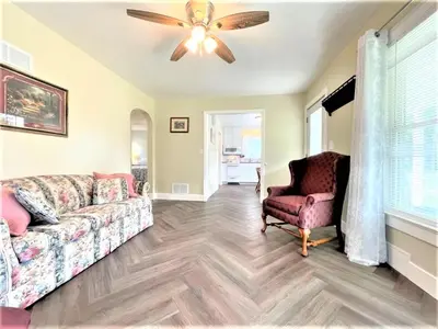 a living room with a couch and a ceiling fan at Walnut - Family Neighborhood, Pet Friendly in Paulding