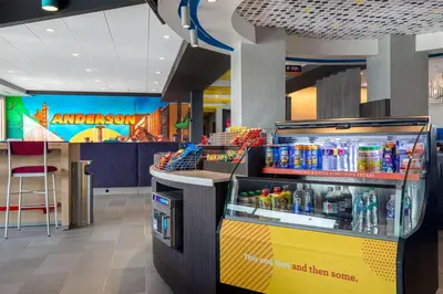a drink station in a store with a drink cooler at Tru By Hilton Anderson in Anderson