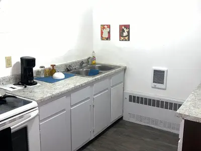 a kitchen with a sink and a counter top at The Haven in Toledo