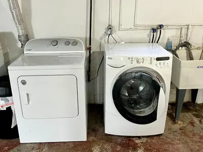 a washing machine and a washer in a room at Private Bedroom Suite 4 Cape Cod Cutie 10 Min to Downtown in Bromley