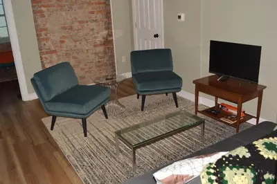 two chairs and a table in a living room at Eco Friendly Home by Cincy w Office Space in Dayton