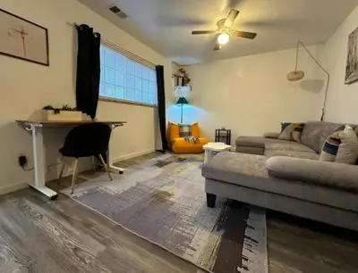 a living room with a couch and a desk at Nationwide Childrens Hospital close by in Columbus