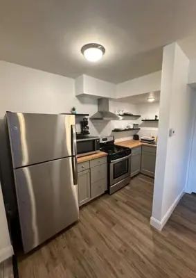 a large kitchen with a stainless steel refrigerator at Nationwide Childrens Hospital close by in Columbus