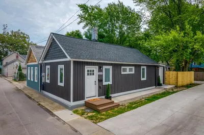 a tiny house is shown on the side of a street at Charming Home in Cleveland 3219 in Ohio City