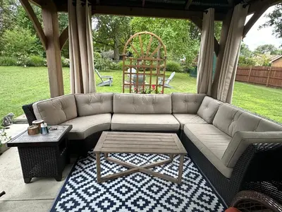 a living room with a couch and a table at Irena Bed and Breakfast in Middleburg Heights