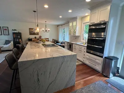 a kitchen with a large island in the middle at Irena Bed and Breakfast in Middleburg Heights