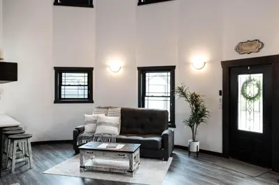 a living room with a couch and a coffee table at Harvest Haven in Seaman