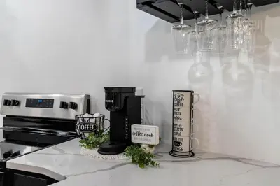 a kitchen counter with a coffee maker and a toaster at Harvest Haven in Seaman