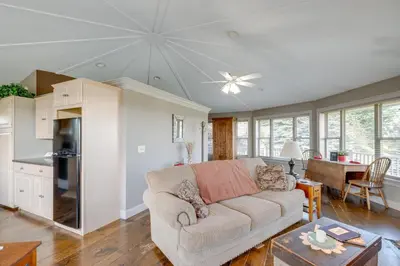 a living room with a couch and a table at Panoramic Views Hillside Millersburg Studio in Millersburg