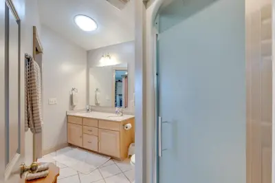 a bathroom with a sink and a mirror at Millersburg Getaway with Amish Country Views! in Millersburg