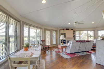 a living room with a couch and a table at Millersburg Getaway with Amish Country Views! in Millersburg