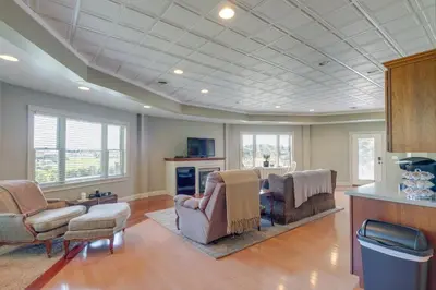 a living room with couches chairs and a tv at Holmes With a View Studio Millersburg Retreat! in Millersburg
