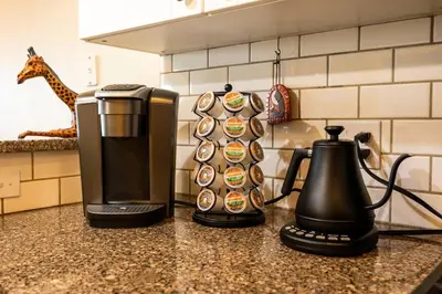 a coffeemaker and a coffee maker on a kitchen counter at RiverFront Landing in Rossford